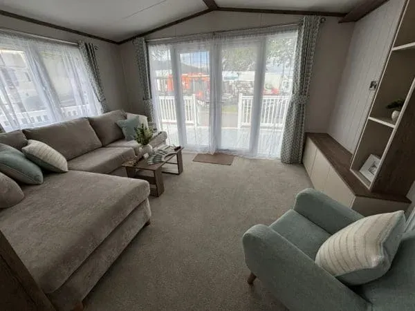 Property photo 2 of 11 Bright Lounge With Patio Doors And Comfortable Seating
