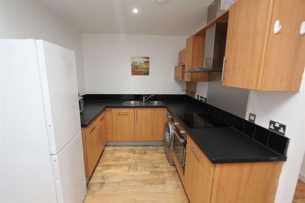Property photo 3 of 10 Modern U-Shaped Kitchen With Sleek Worktops...