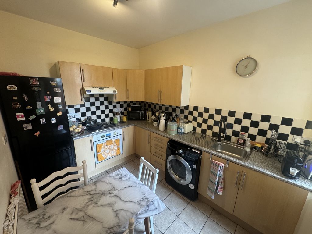 Property photo 2 of 12 Kitchen