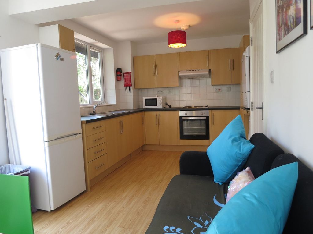 Property photo 2 of 21 Bright Open-Plan Kitchen With Light Wood Cabinets,...