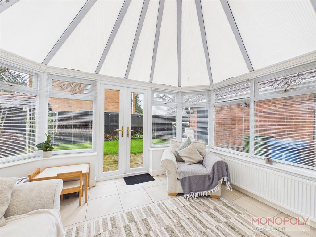 Property photo 3 of 12 Conservatory