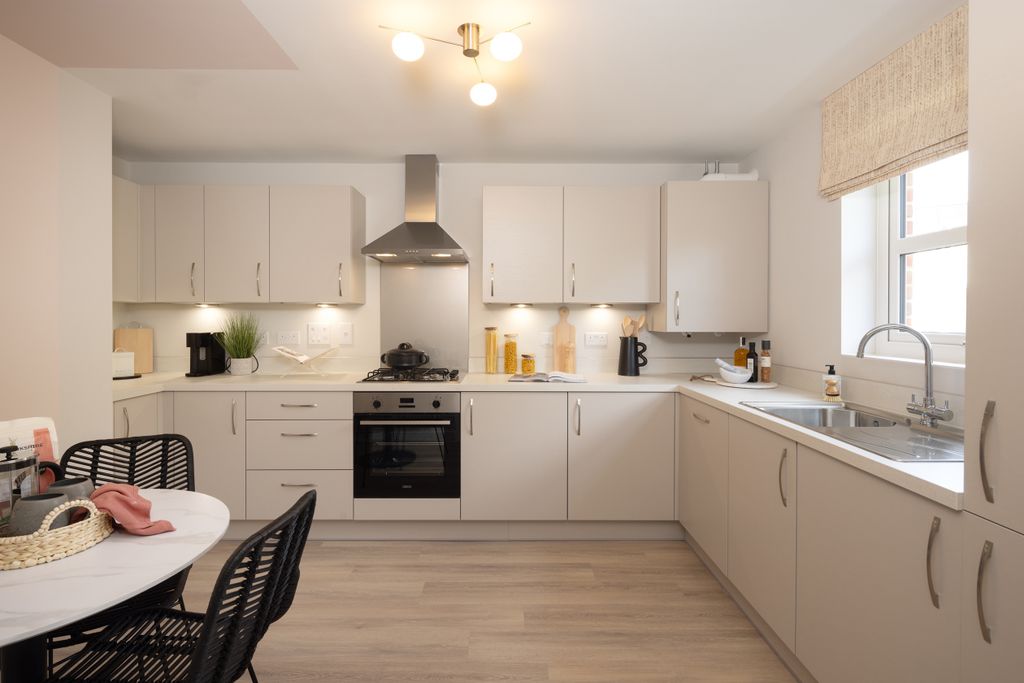 Property photo 2 of 6 Kitchen And Breakfast Area In 3 Bed Portmore Show Home