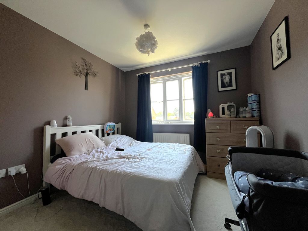 Property photo 2 of 13 Primary Bedroom