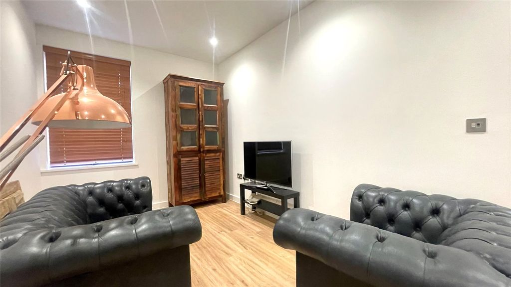 Property photo 2 of 6 Living Area