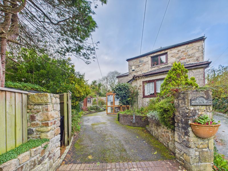 Property photo 1 of 12 Driveway And Elevation