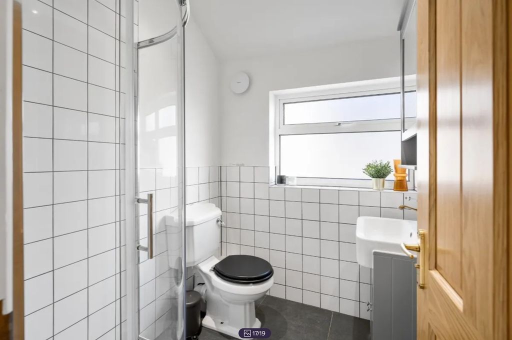 Property photo 2 of 19 A Modern And Bright Bathroom Featuring A Spacious ...