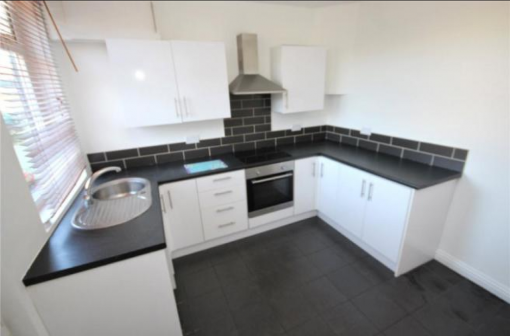 Property photo 3 of 7 Kitchen