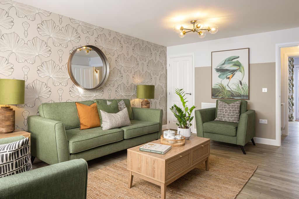 Property photo 2 of 7 Living Room With Green Sofa In A 3 Bedroom Home