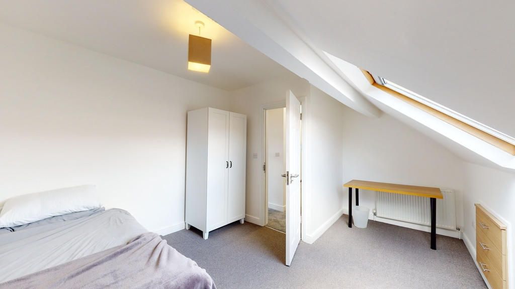 Property photo 2 of 14 A Spacious And Bright Master Bedroom Featuring A l...