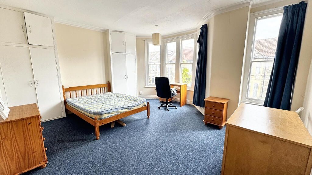 Property photo 1 of 12 Bright And Spacious Master Bedroom Featuring A Lar...