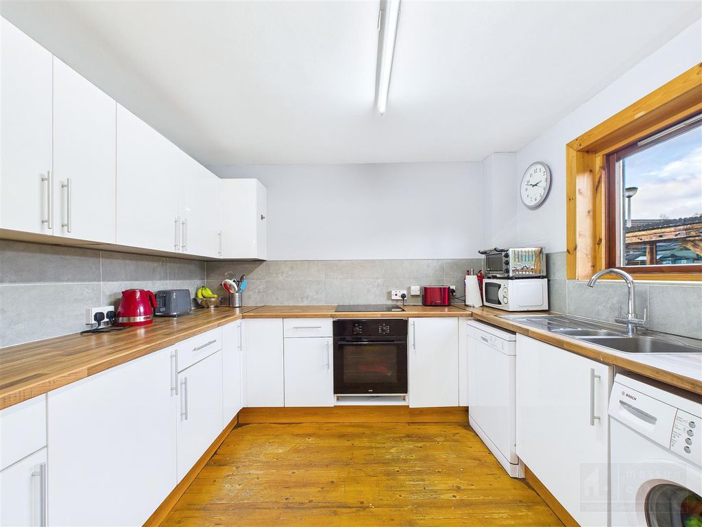 Property photo 3 of 26 Kitchen