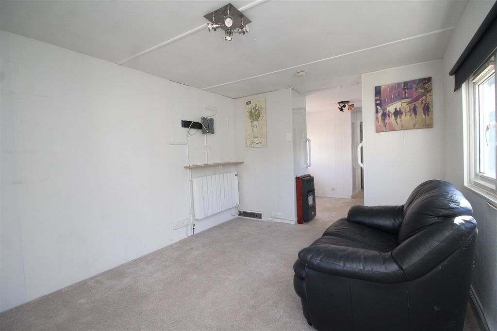 Property photo 3 of 11 Living Room 2 .Jpg