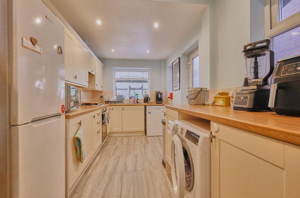 Property photo 3 of 11 Fitted Kitchen To Rear