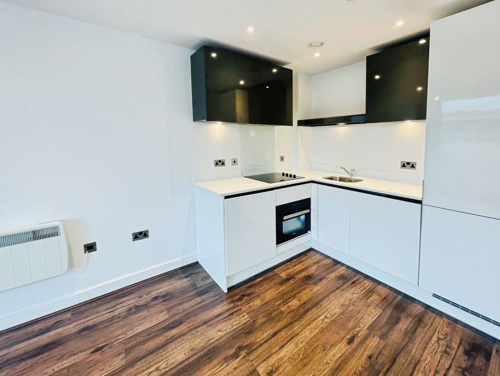 Property photo 3 of 7 Kitchen Area