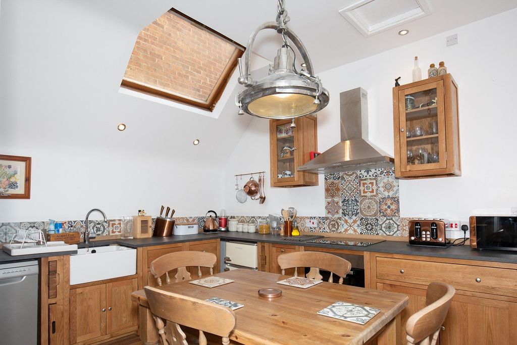 Property photo 3 of 9 Dining Kitchen