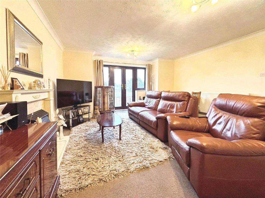 Property photo 3 of 16 Living Room