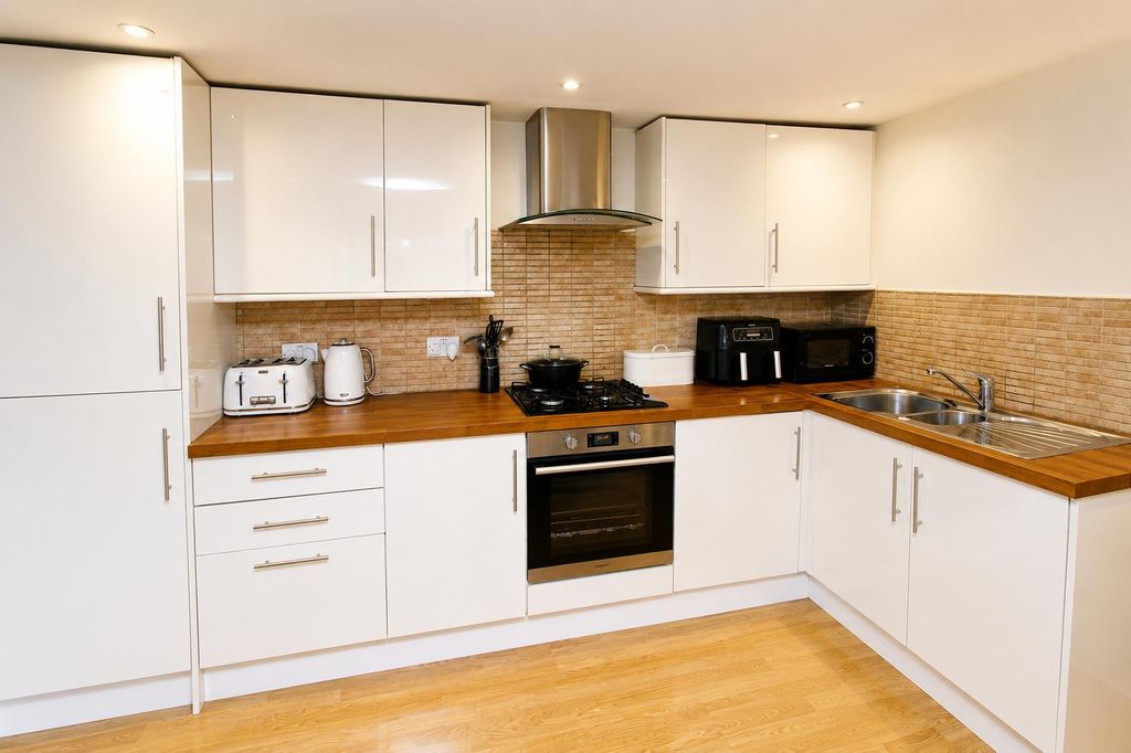 Property photo 2 of 15 Kitchen Area