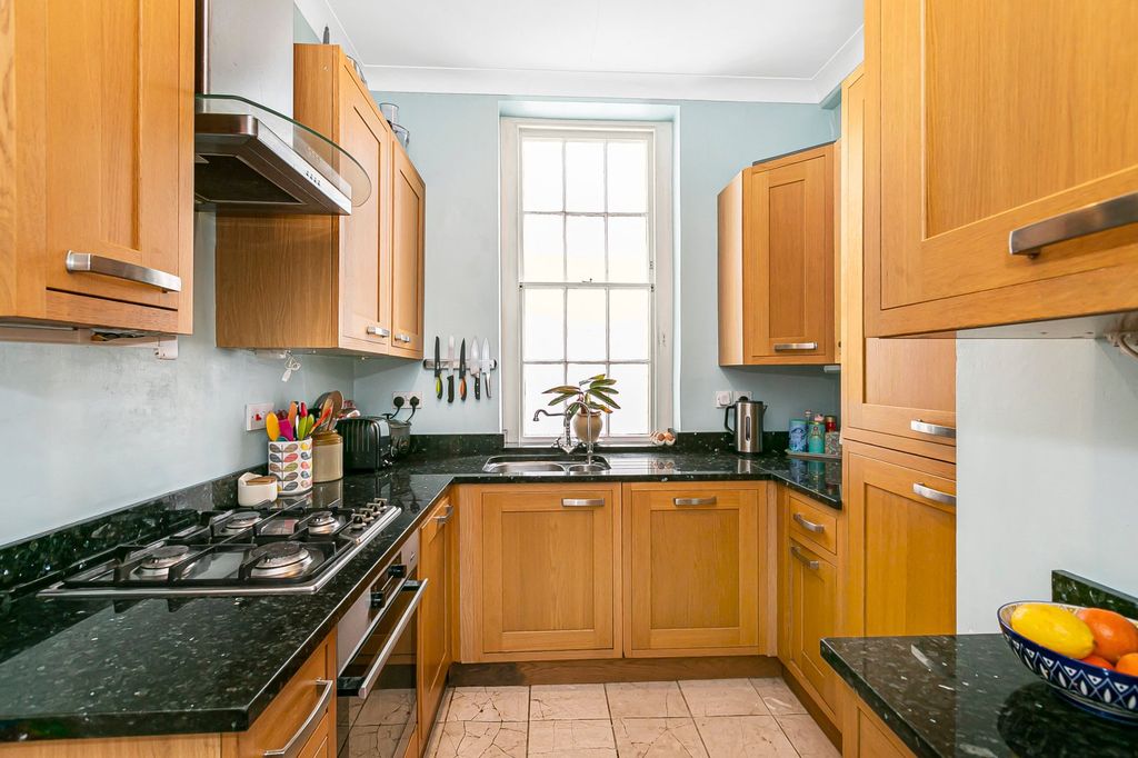 Property photo 2 of 12 Kitchen
