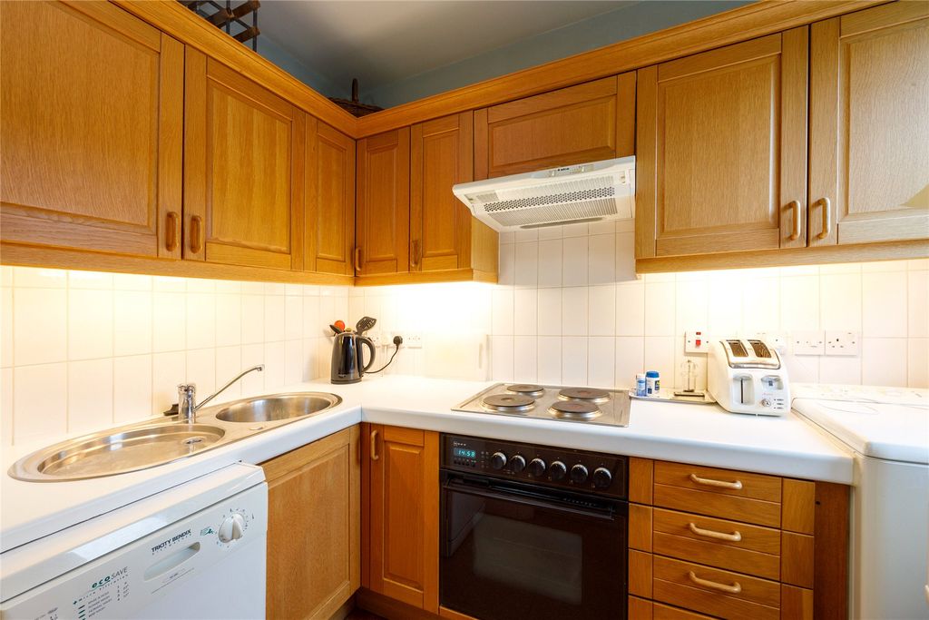 Property photo 3 of 8 Kitchen