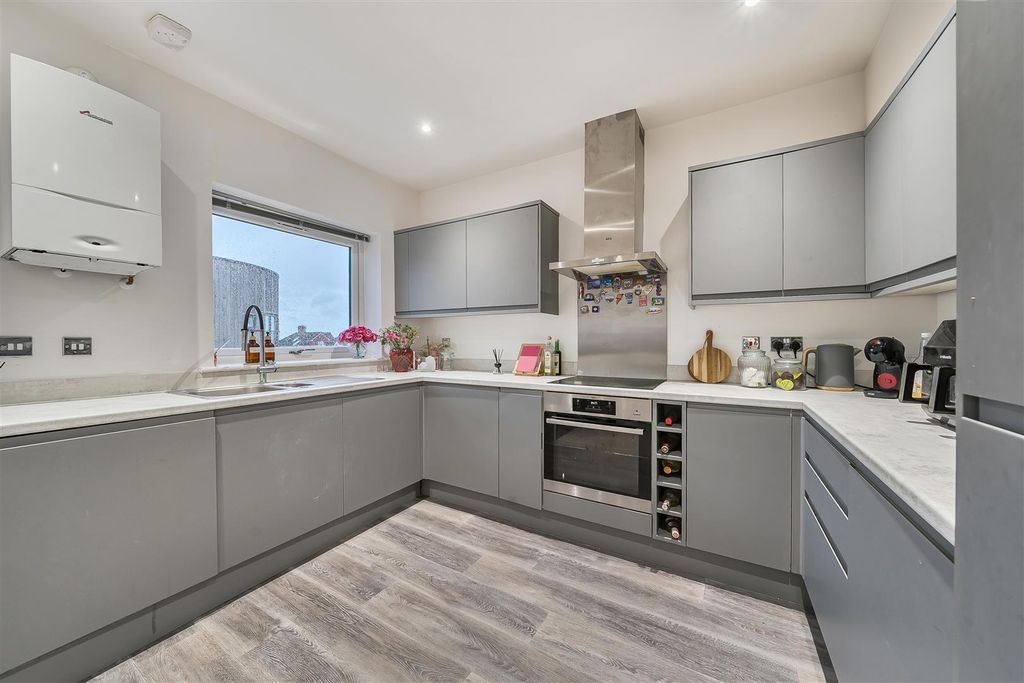 Property photo 3 of 13 Kitchen Area