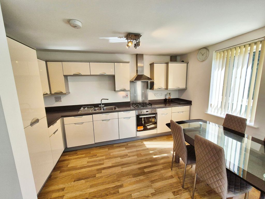 Property photo 1 of 11 Kitchen Area