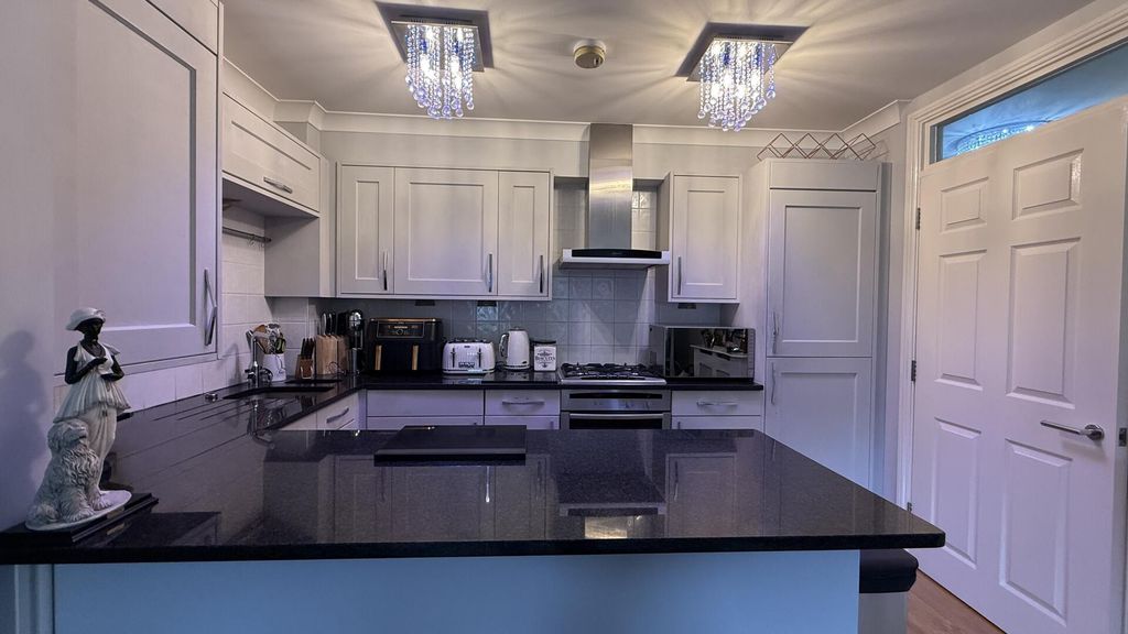 Property photo 2 of 12 Kitchen