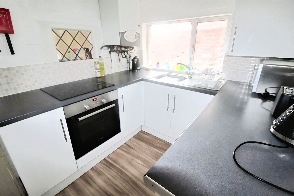 Property photo 2 of 15 38B77086-Kitchen