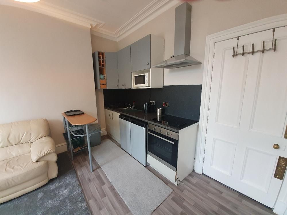 Property photo 3 of 9 Kitchen Area