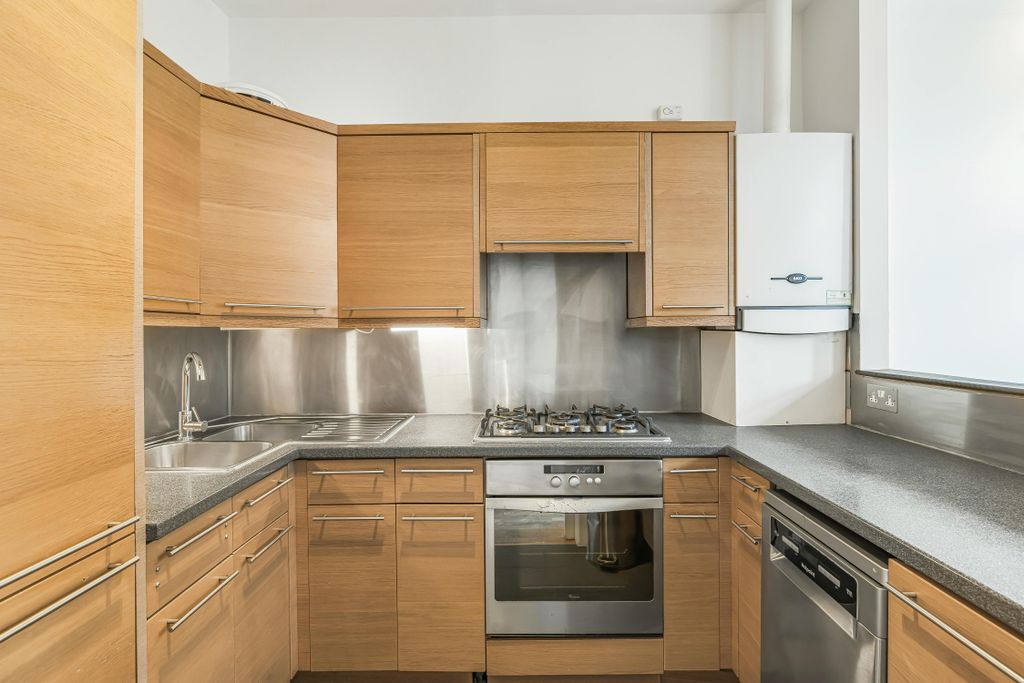 Property photo 3 of 16 Kitchen