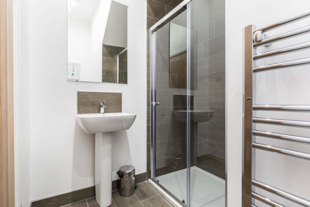 Property photo 2 of 11 Modern Ensuite Bathroom With A Glass Shower Cubicl...
