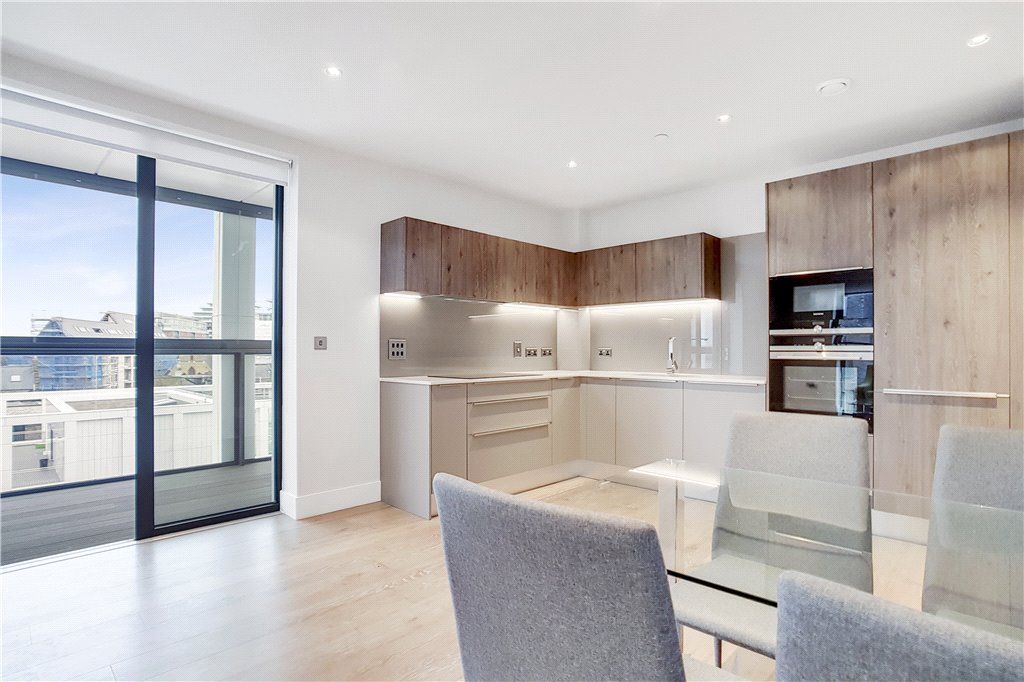 Property photo 3 of 14 Kitchen-Dining Area