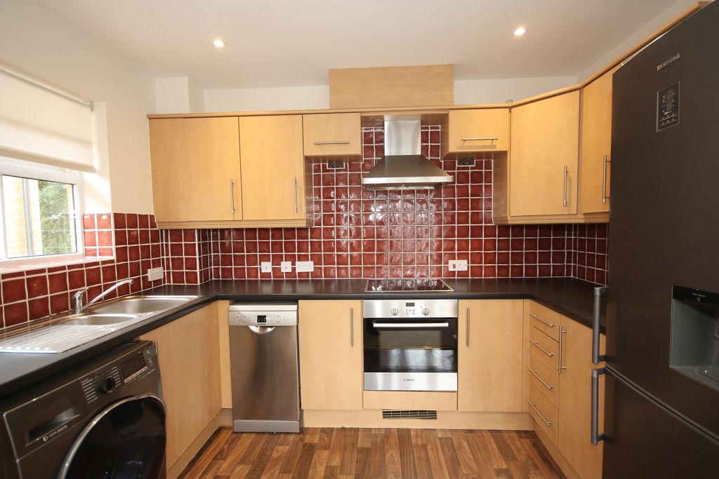 Property photo 3 of 7 Kitchen