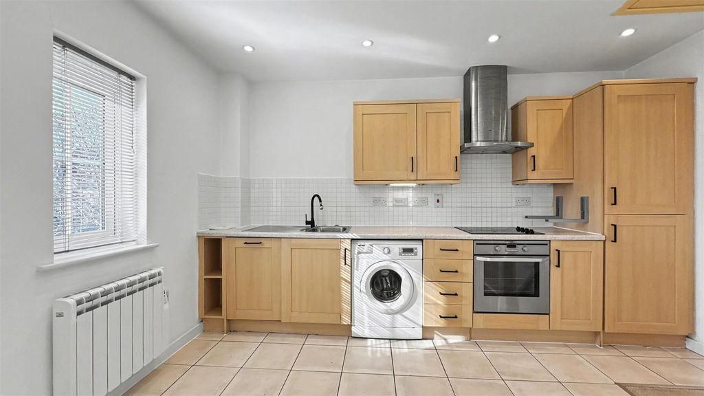 Property photo 3 of 6 Kitchen Area