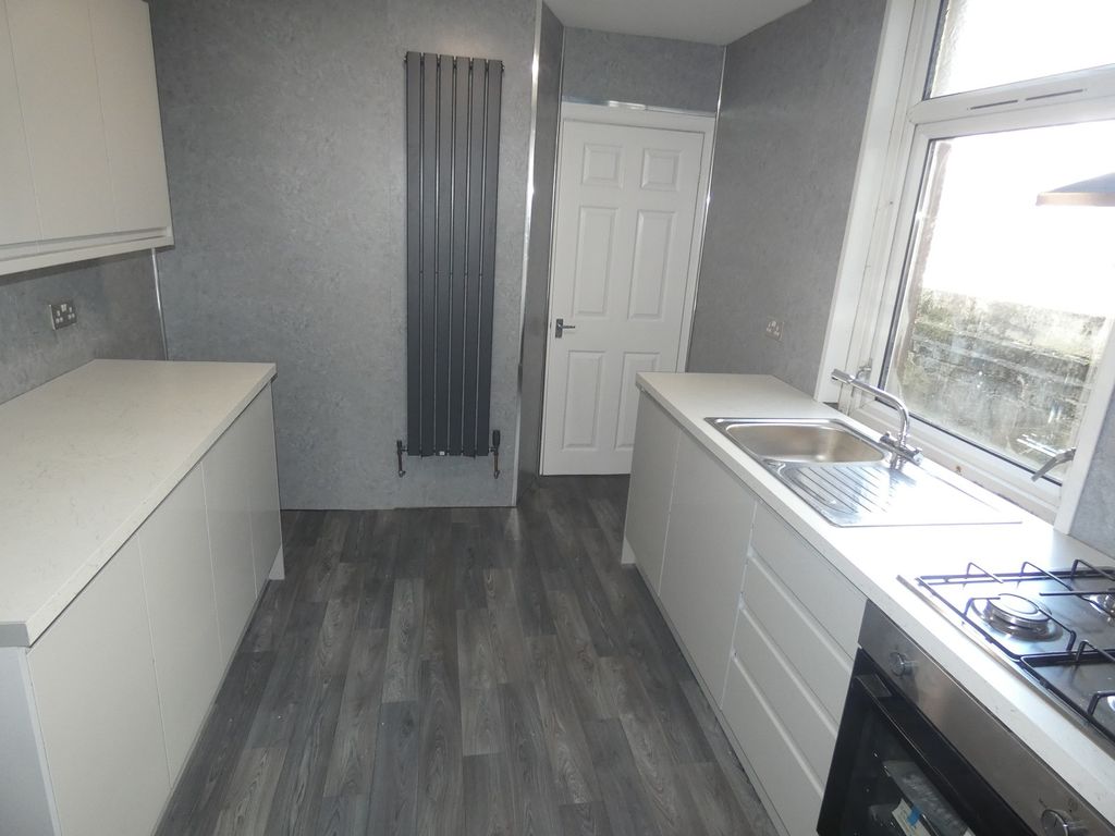 Property photo 2 of 12 Kitchen