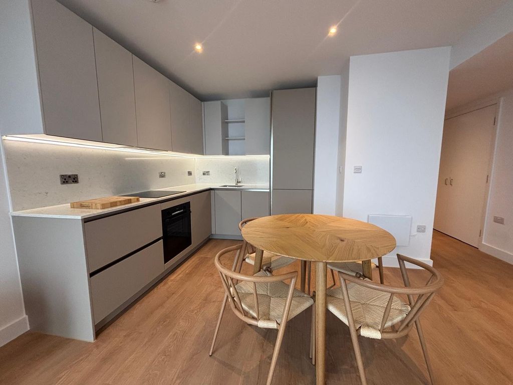 Property photo 3 of 12 Kitchen &amp; Dining