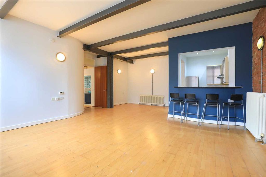 Property photo 2 of 10 Living Area