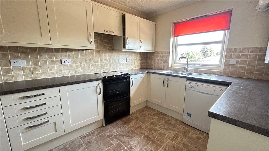 Property photo 1 of 11 Kitchen New