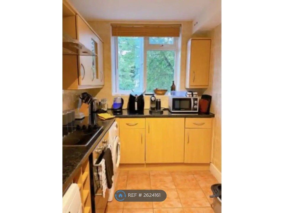 Property photo 3 of 12 Kitchen