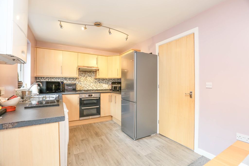 Property photo 2 of 13 Dining Kitchen