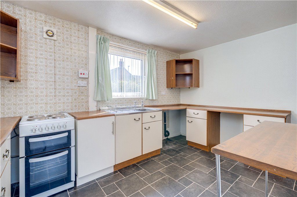 Property photo 3 of 12 Kitchen
