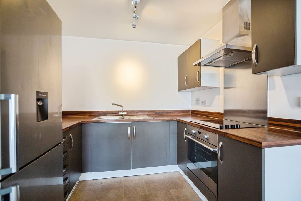Property photo 3 of 13 Kitchen