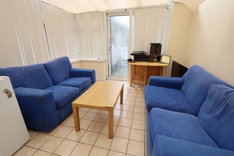 Property photo 3 of 12 Conservatory