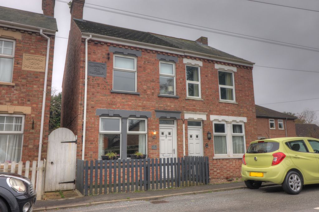 Property photo 1 of 18 Front 2