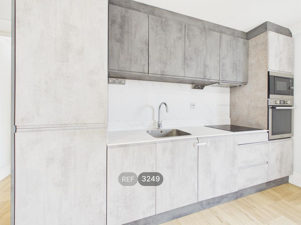 Property photo 2 of 17 Kitchen / Living Area