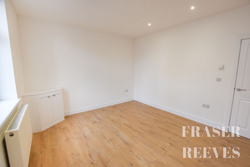 Property photo 3 of 17 Living Room