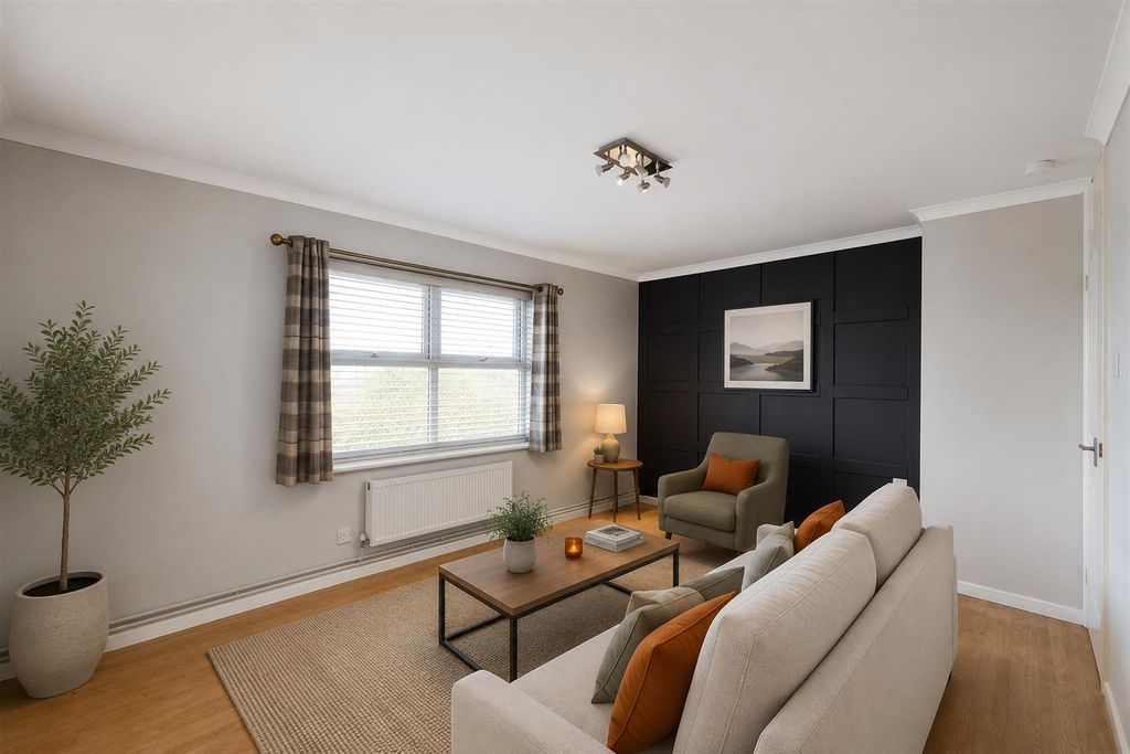 Property photo 3 of 8 John - Lounge 2.Png