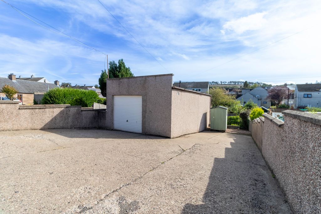 Property photo 2 of 23 Driveway &amp; Garage