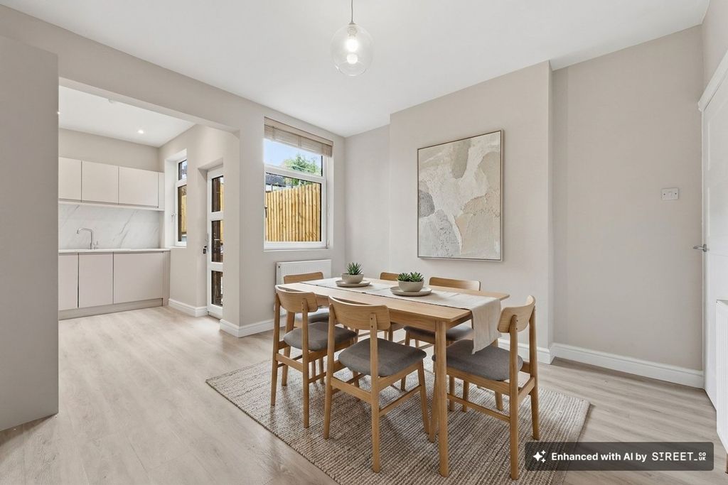 Property photo 3 of 20 Virtually Staged Dining Room