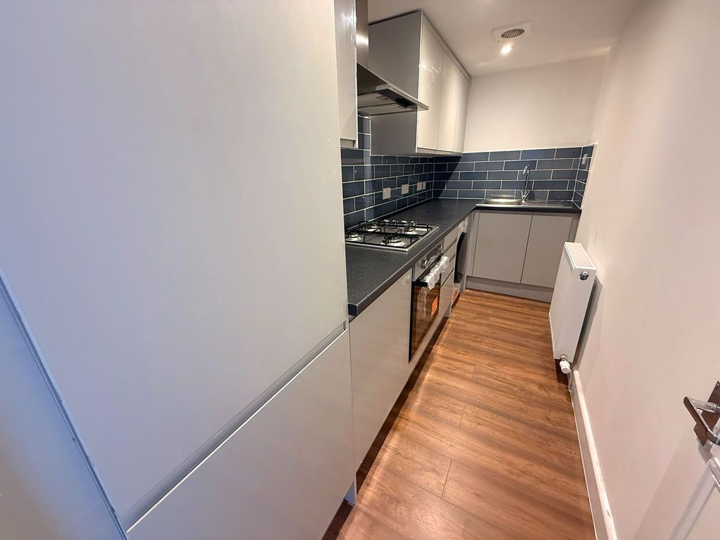 Property photo 3 of 7 Kitchen