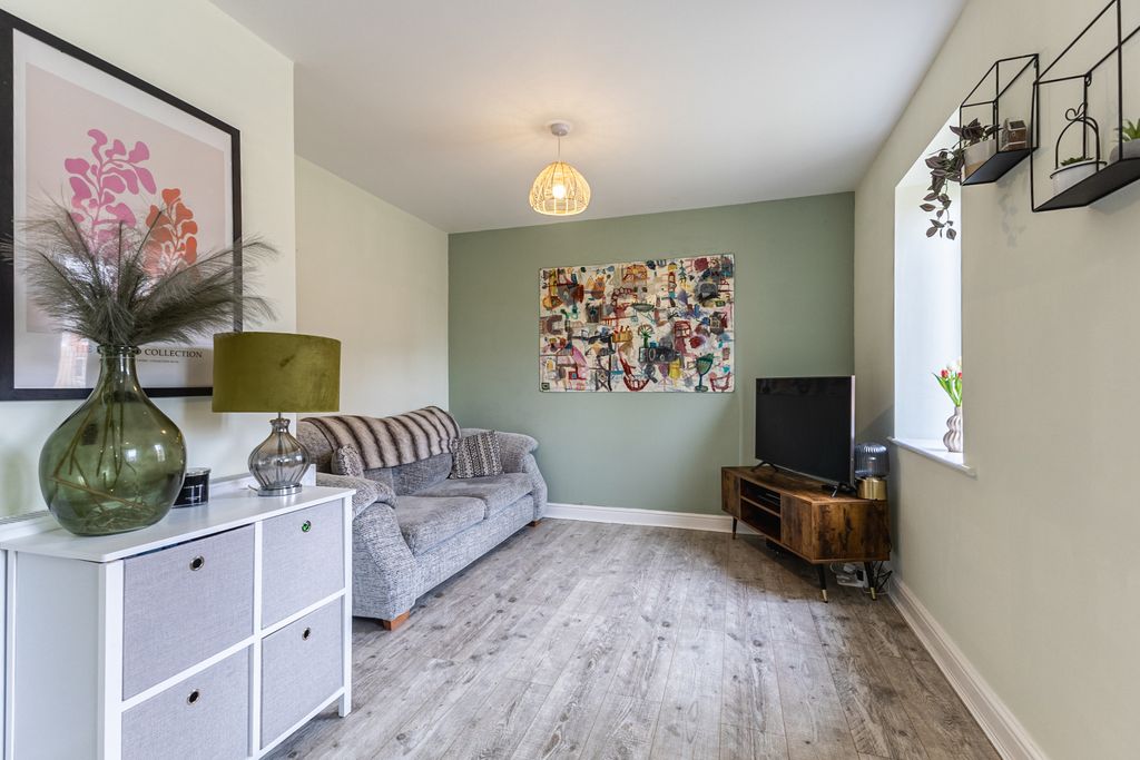 Property photo 3 of 13 Living Area